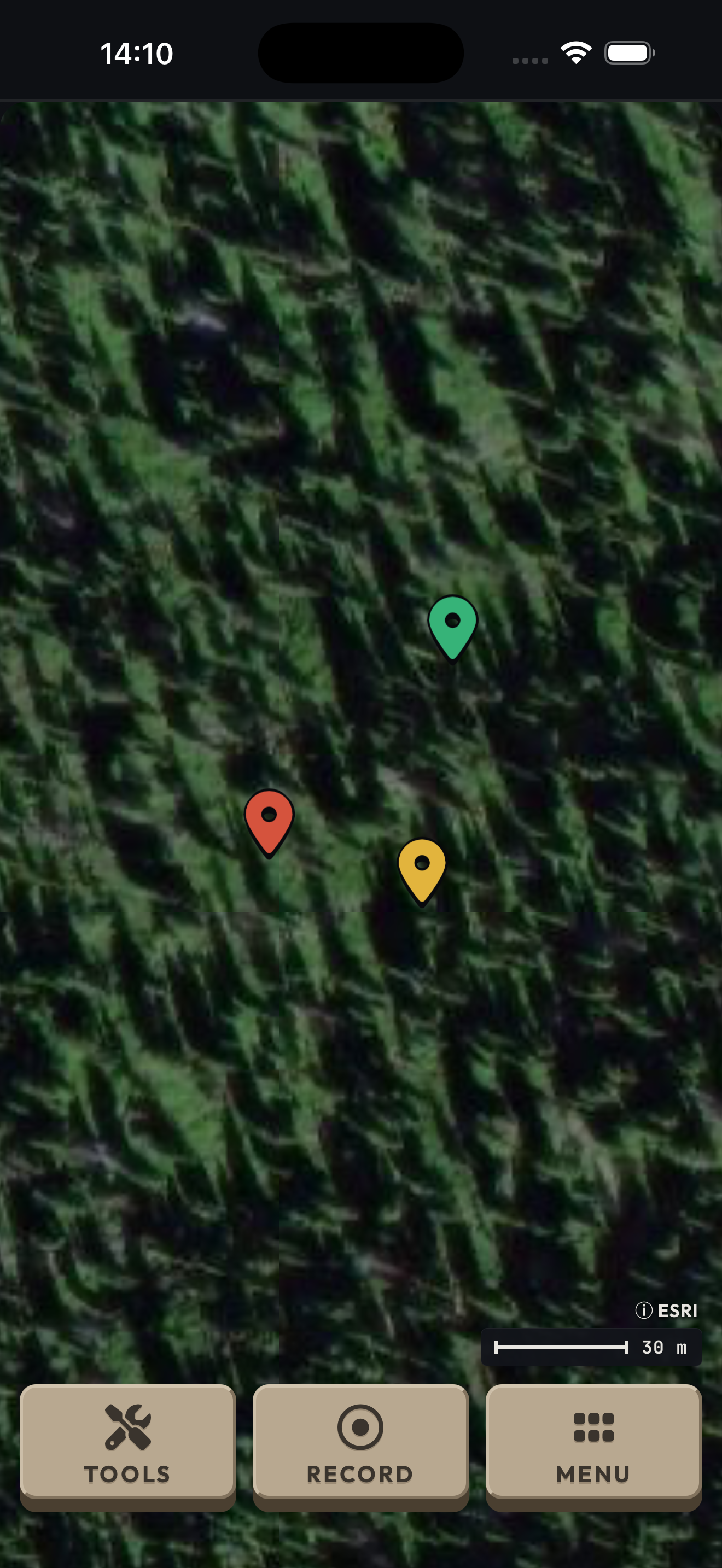 Genuine AllTraxx simulator map over forest terrain, with a green Camp pin above a red Avoid here pin and a yellow Big Swamp pin. This guide adds the name labels below the actual native markers.